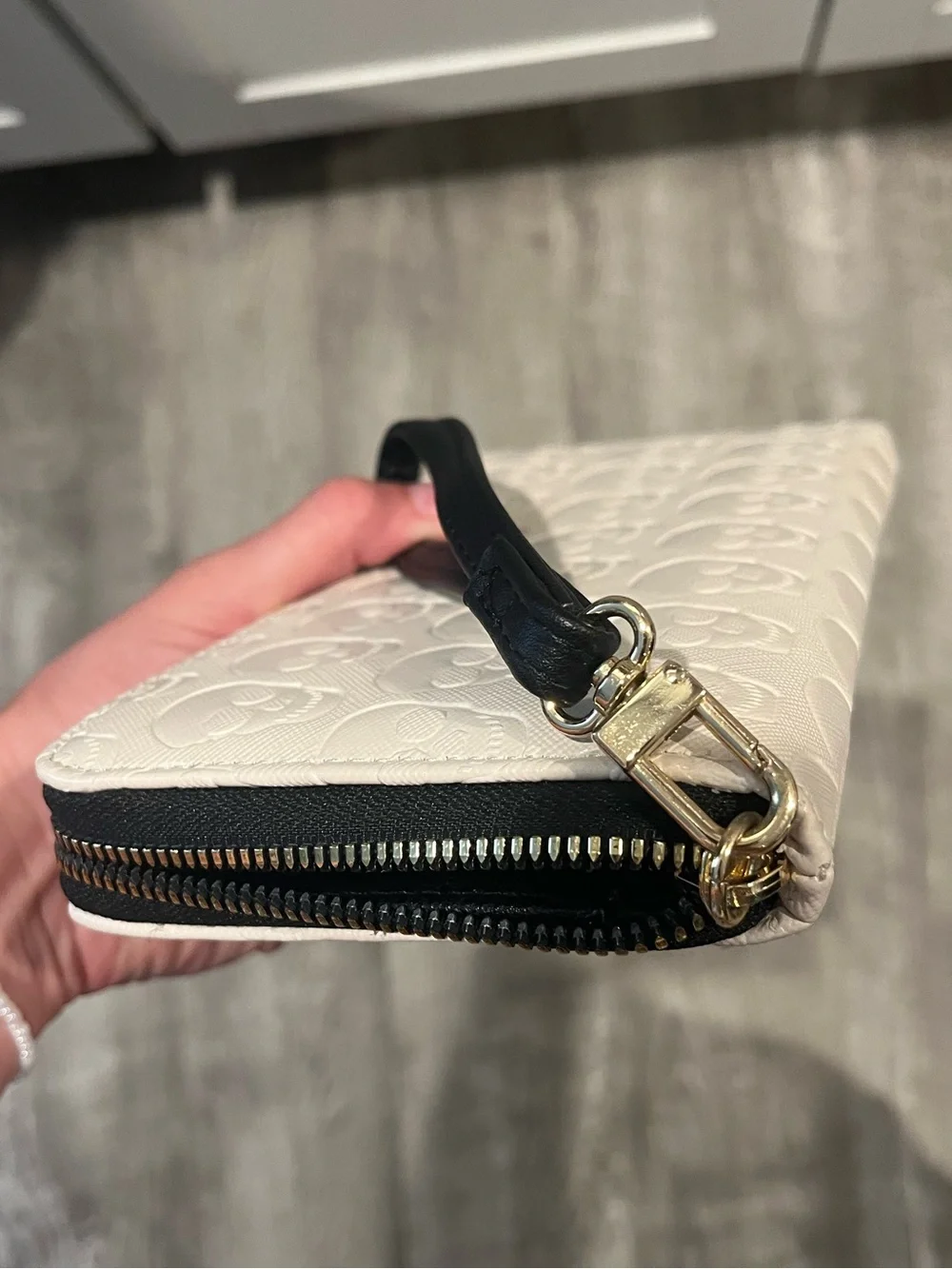 Betsy Johnson Cream Skull Embossed Zip Wallet with Gold Plaque